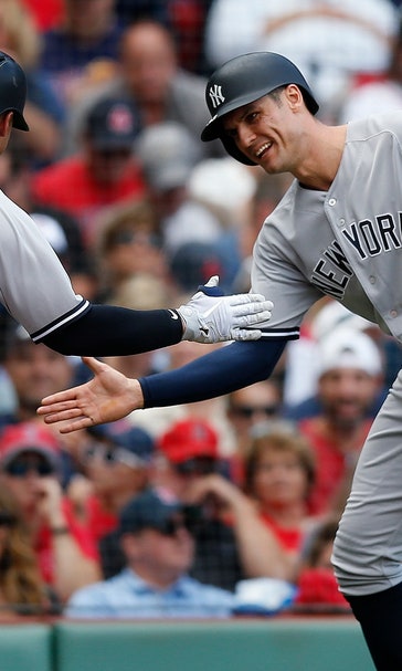 Yankees set HR record, beat Red Sox 8-5 for 100th win
